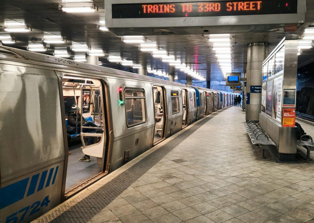 A subway train stopped at a train station