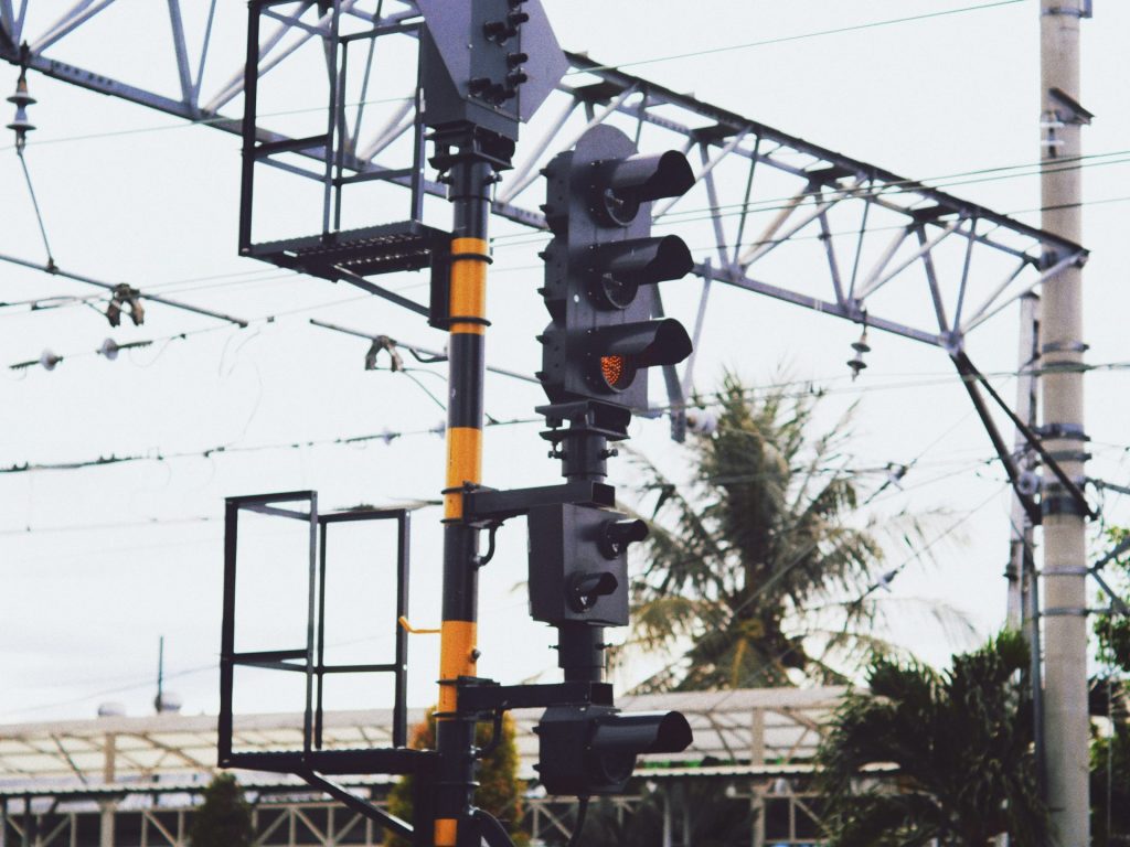 a traffic light sitting on the side of a road